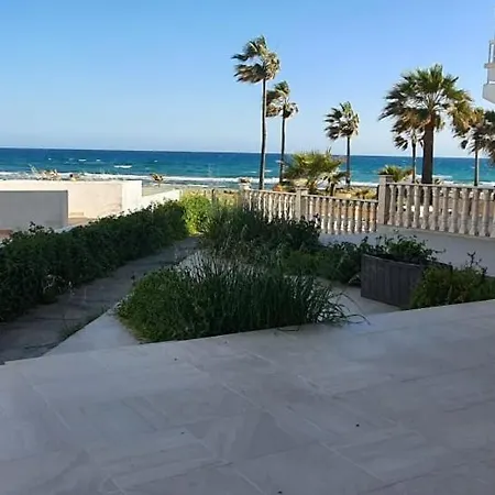 Blue Beachfront House Next To Golden Bay